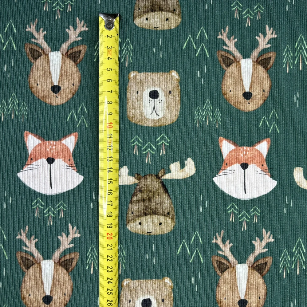 žebrovaný úplet - hlavy lesních zvířat