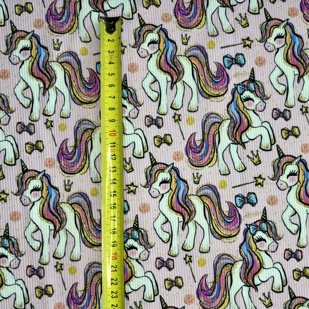 žebrovaný úplet -jednorožec na růžové